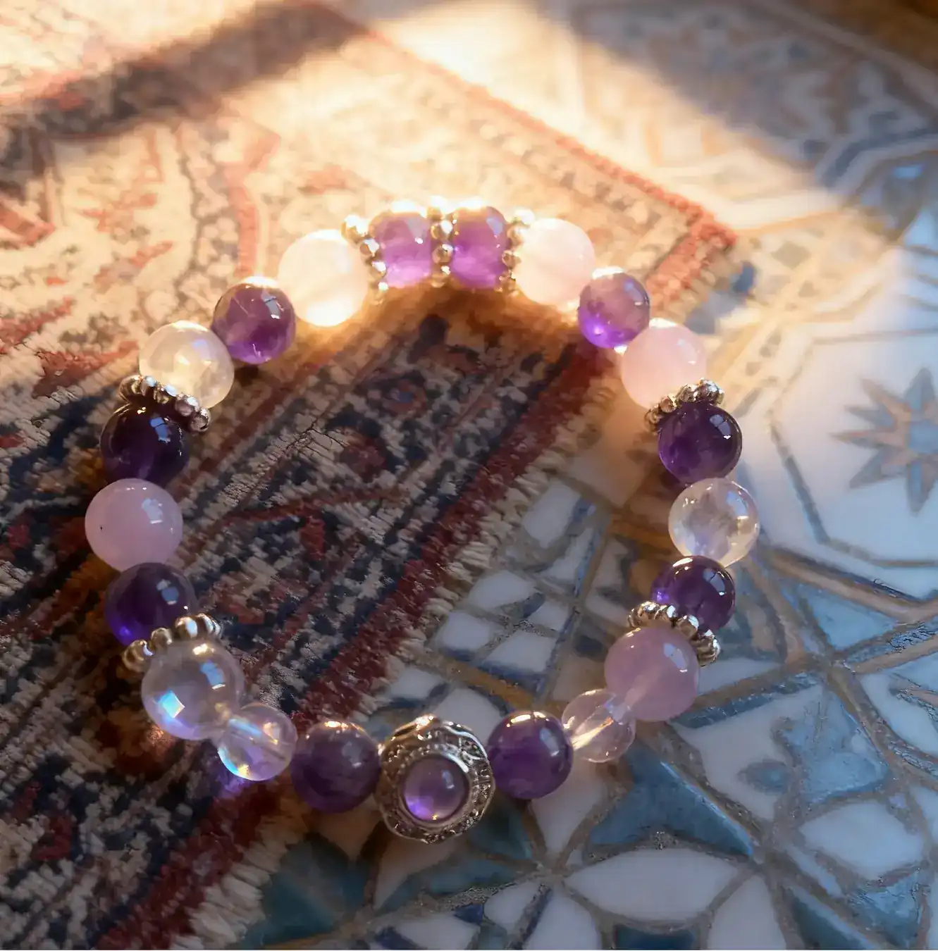 Aurora Blessing purple super seven and purple chalcedony crystal bracelet, an angled view of the strand
