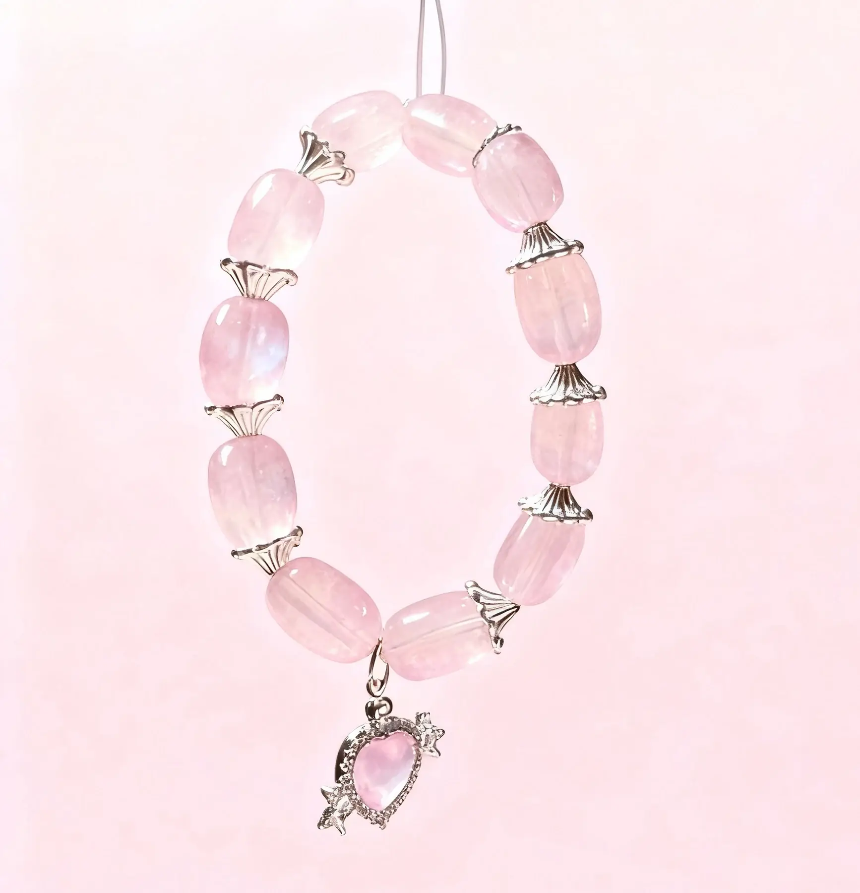Blossom Sync rose quartz crystal bracelet, close view of the beads