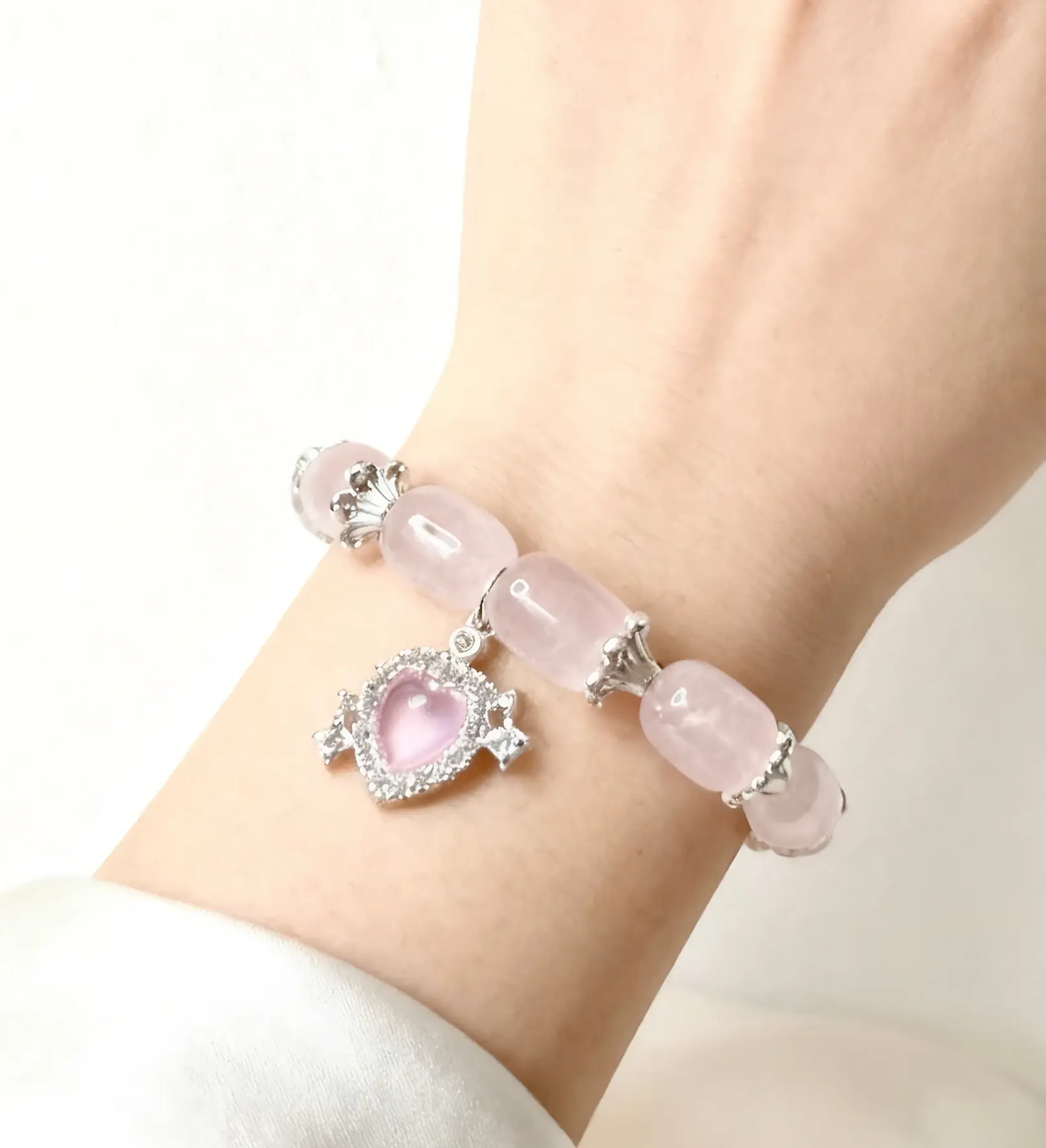 Blossom Sync rose quartz crystal bracelet, the full strand
