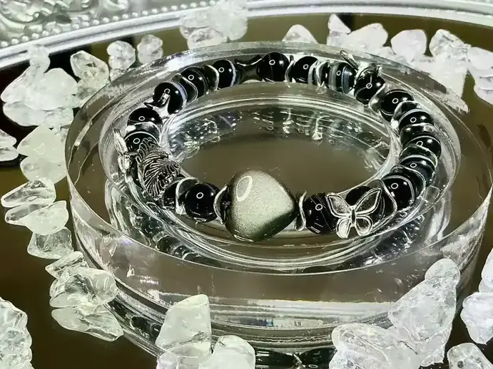 Feather of Purity black Persian agate and silver obsidian crystal bracelet, the accent fittings