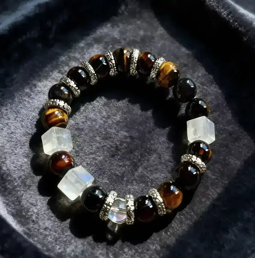 Magic Tiger Spirit rainbow tiger's eye and clear quartz crystal bracelet, an angled view of the strand