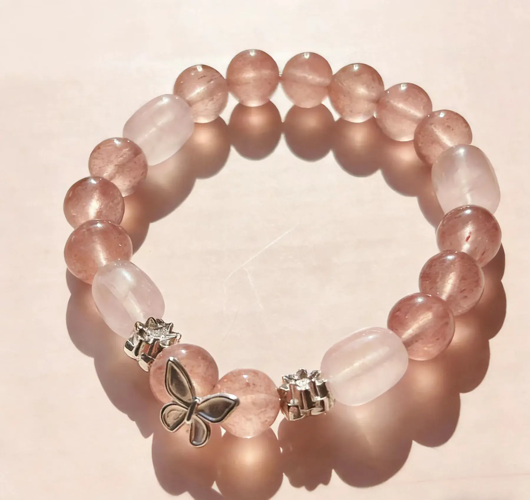 Tender Bond strawberry quartz and rose quartz crystal bracelet, the full strand