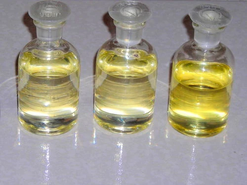 Three glass reagent bottles of pale yellow non-ionic surfactant