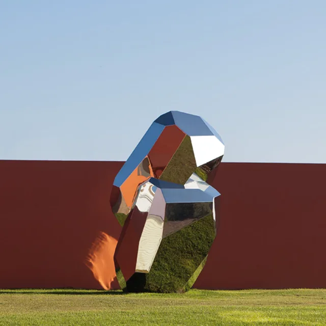 Large stainless steel sculpture—Crystal stone in close view