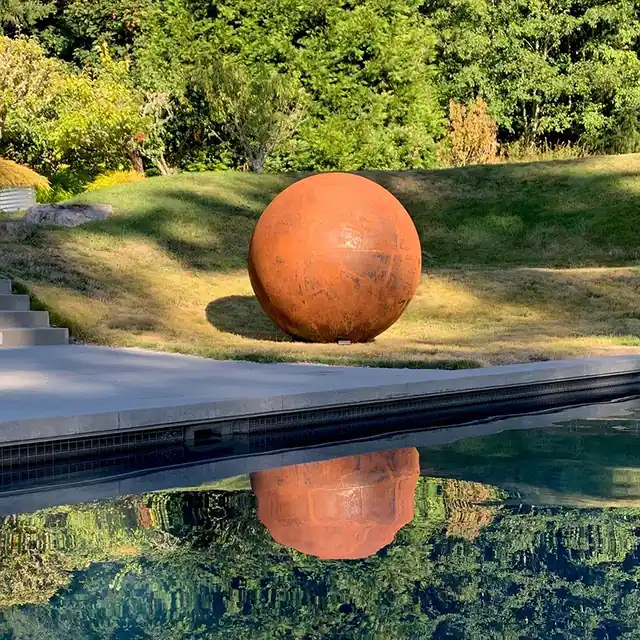 Outdoor garden Courtyard Stainless steel oval ball sculpture seen from another angle