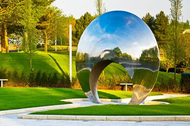 Large stainless steel sculpture—Space-time tunnel from the side