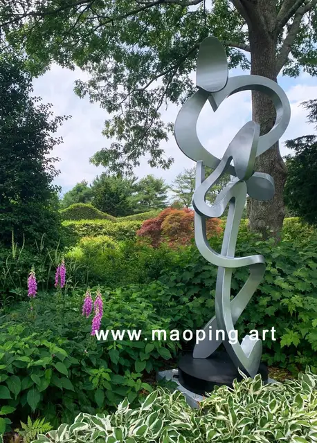 Outdoor garden courtyard Stainless Steel Metal Abstract Ribbon Sculpture seen from another angle