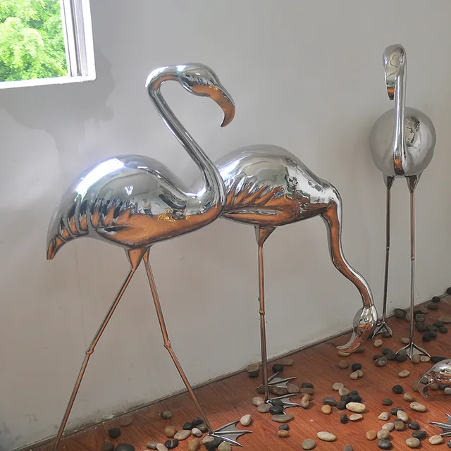 Large stainless steel sculpture—Flamingos in close view