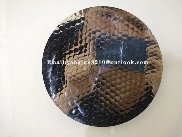 Scale Armour Concave Mirror Sculpture seen from another angle