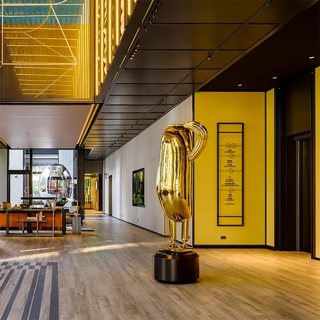 Golden Stainless Steel Bird Sculpture at a Taipei Hotel