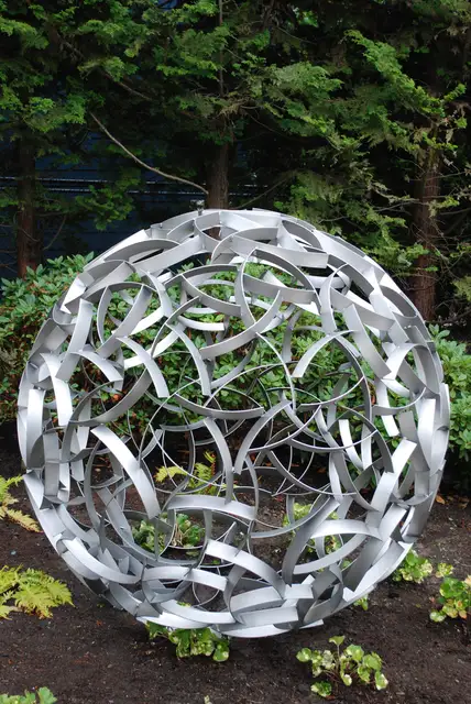 Large stainless steel sculpture—Hollow ball seen from another angle