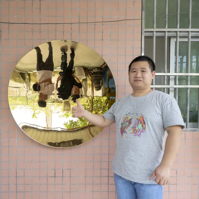 Gold Concave Mirror Sculpture at the Metropolitan Museum of Art–Electroplated concave mirror