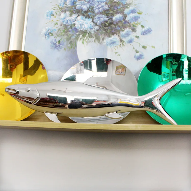 Custom office furnishings, mini sculptures—fish
