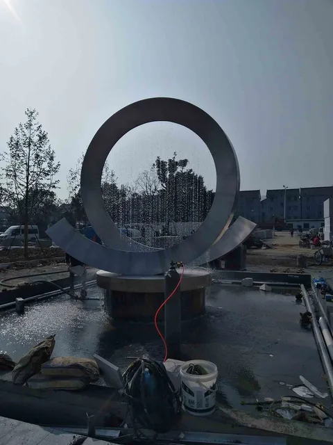 Free standing circle shape garden waterfall fountain surface drawing stainless steel