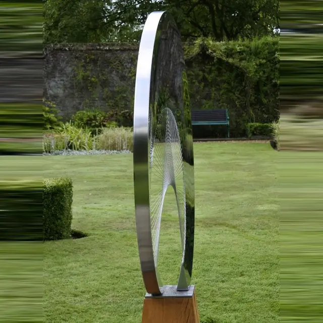 Modern stainless steel statue art abstract metal outdoor sculpture seen from another angle