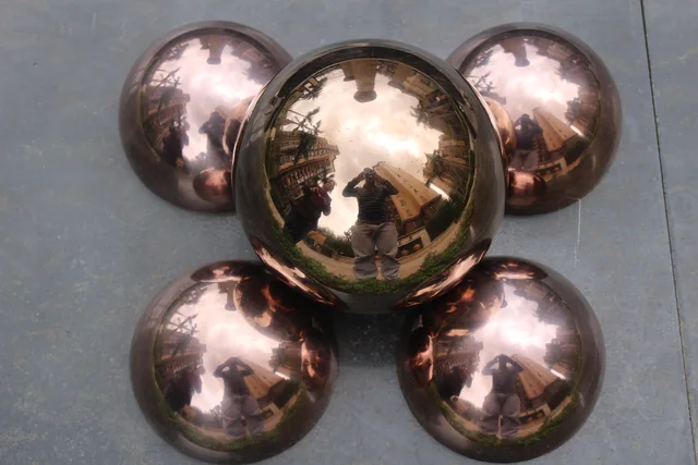 Rose gold Stainless steel colorful sphere Shiny Addition to Any Garden or Home in close view