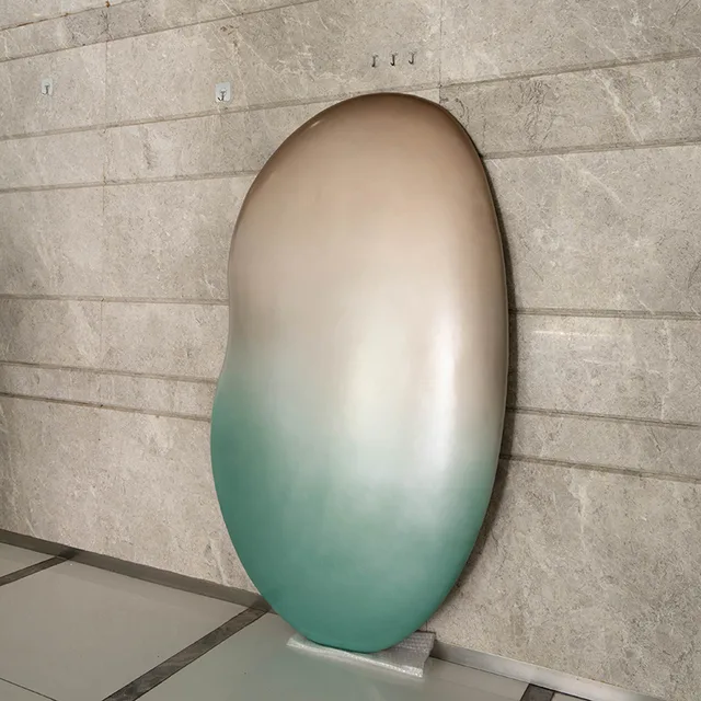 Modern metal home decoration stainless steel wall sculpture shown in its setting
