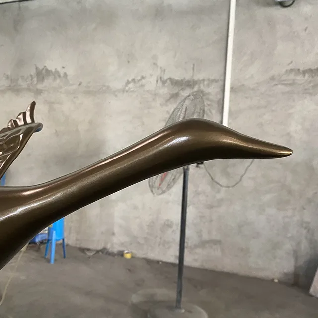 Indoor office home decoration stainless steel Wild goose sculpture in close view