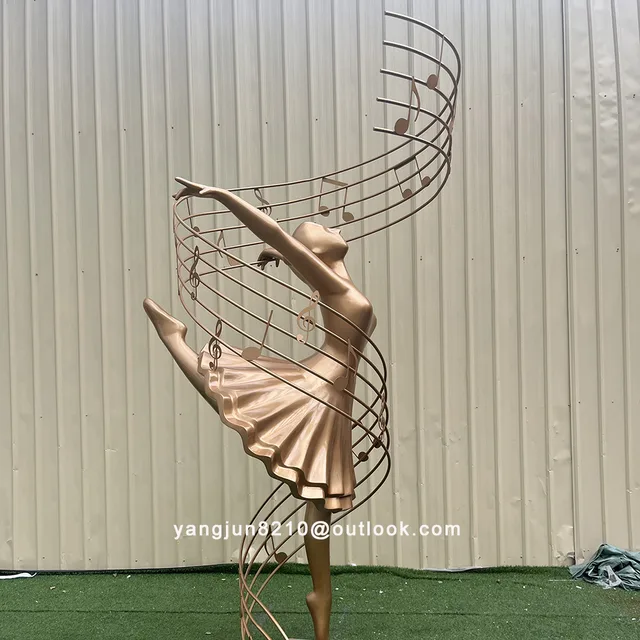 Indoor upscale hotel apartment Outdoor park square garden courtyard art stainless steel dancer sculpture seen from anoth