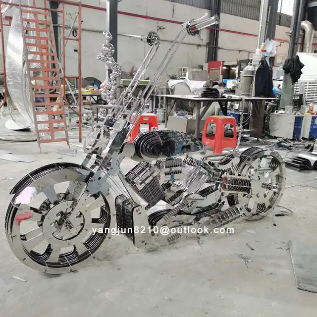 Interior luxury hotel apartment home decorations stainless steel abstract motorcycle sculpture in close view