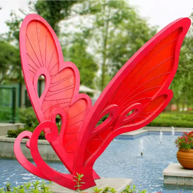 Large Metal Butterfly Stainless Steel Garden Sculpture shown in its setting