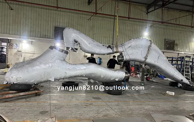 Large outdoor plaza park beach amusement park decorations stainless steel abstract sculpture in close view