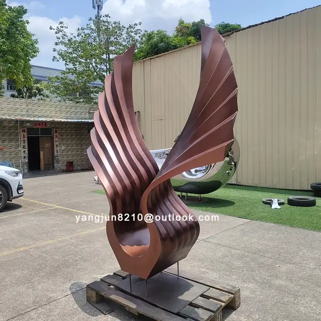 Large outdoor square beach Metal Art stainless steel Abstract Bird Wings sculpture seen from another angle