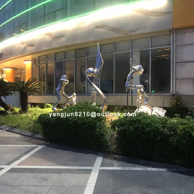 Large outdoor square park courtyard pool decoration art Mark abstract stainless steel sculpture seen from another angle