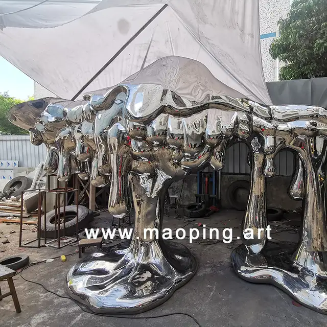 Large outdoor square park Stainless steel abstract yak sculpture in close view