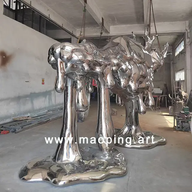 Large outdoor square park Stainless steel abstract yak sculpture seen from another angle