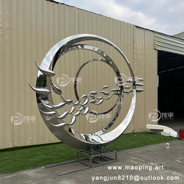 Large outdoor square ring Stainless steel fish sculpture seen from another angle