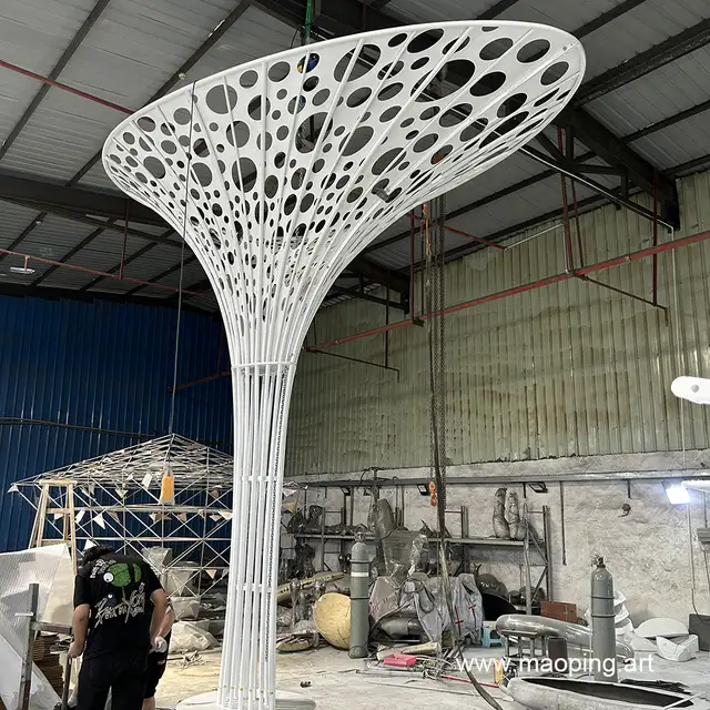 Large outdoor square urban decoration art stainless steel abstract tree sculpture seen from another angle