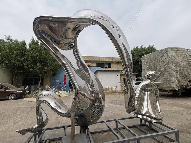 Large outdoor stainless steel poet sculpture statue! in close view