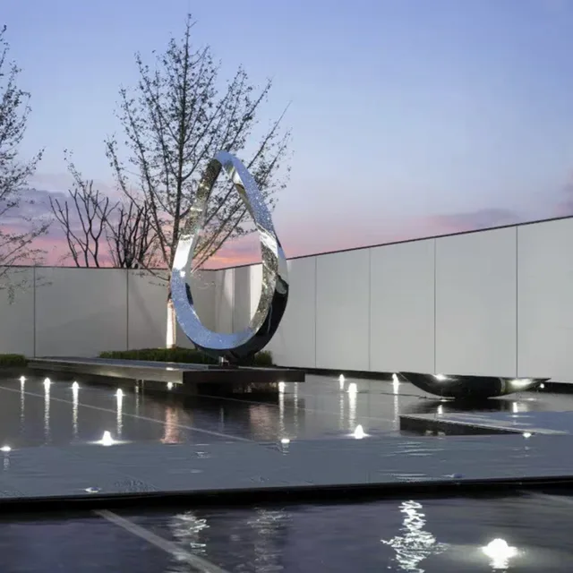 Large outdoor waterscape metal sculpture stainless steel ring sculpture
