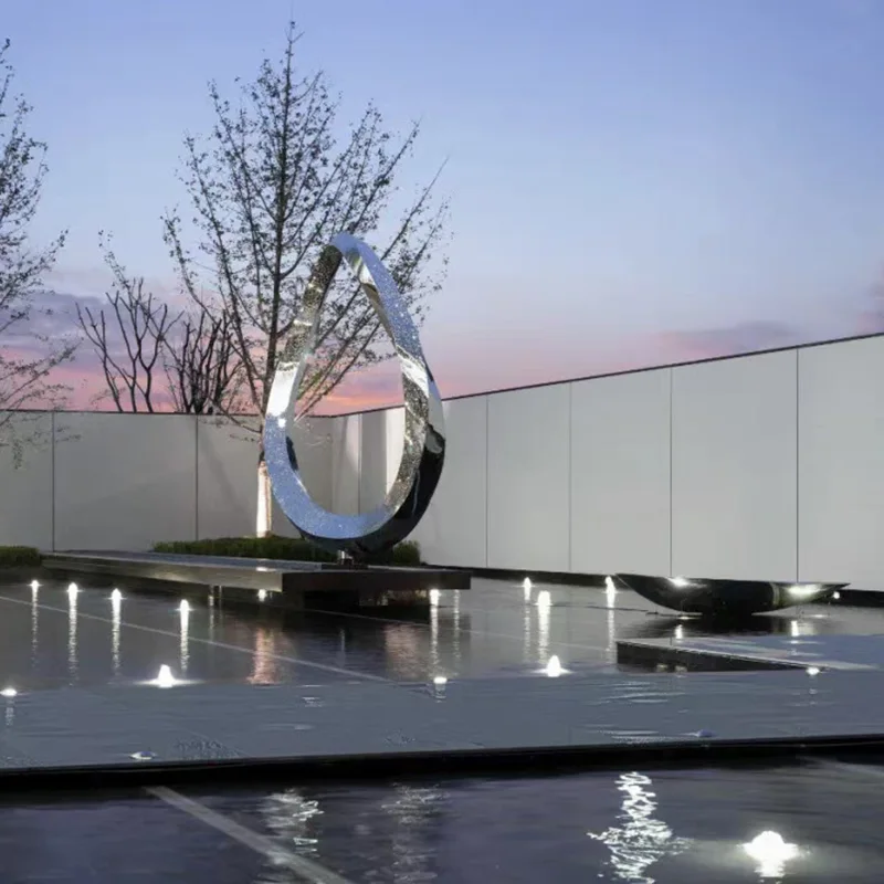 Large outdoor waterscape metal sculpture stainless steel ring sculpture