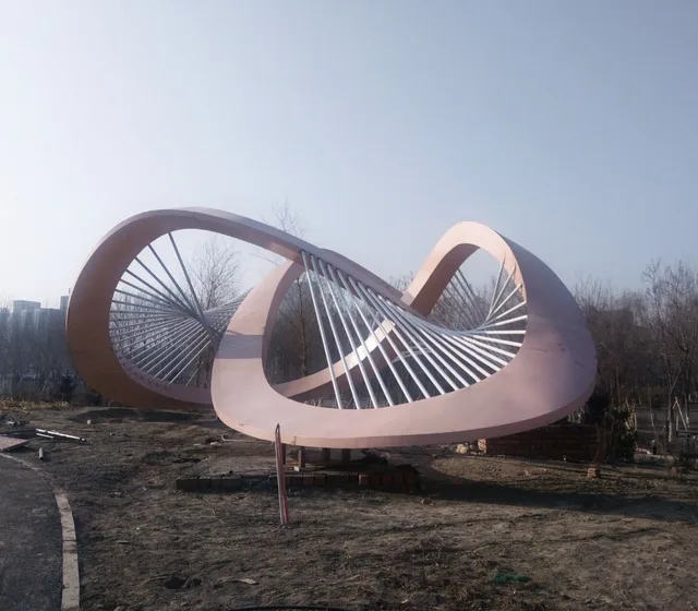 Large stainless steel sculptures in park square