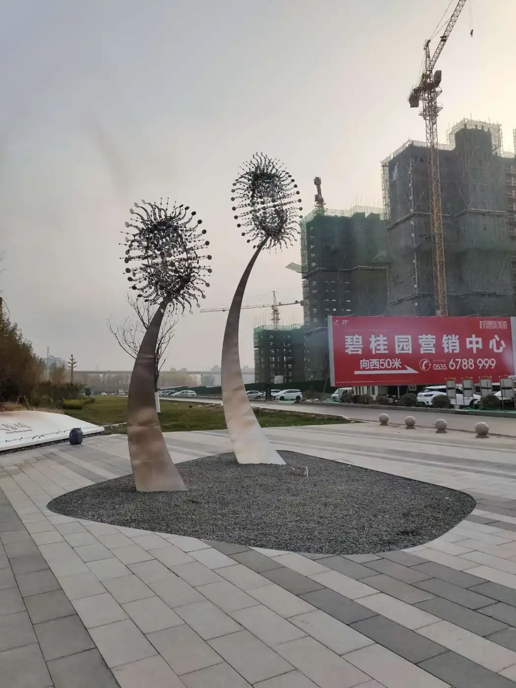 Large stainless steel wind sculptures