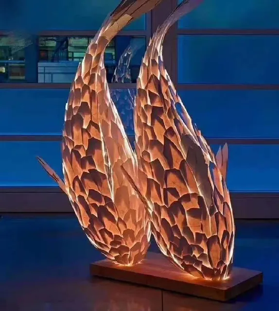 Large outdoor Luminous stainless steel fish sculpture from the side