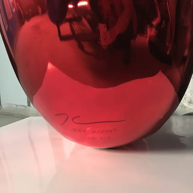 Metal Modern Art Red Stainless Steel Egg Sculpture seen from another angle