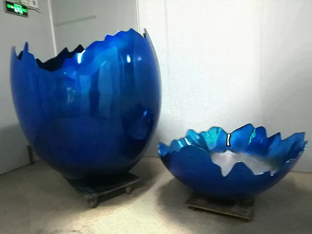 Metal Modern Art blue Stainless Steel Egg Sculpture from the side