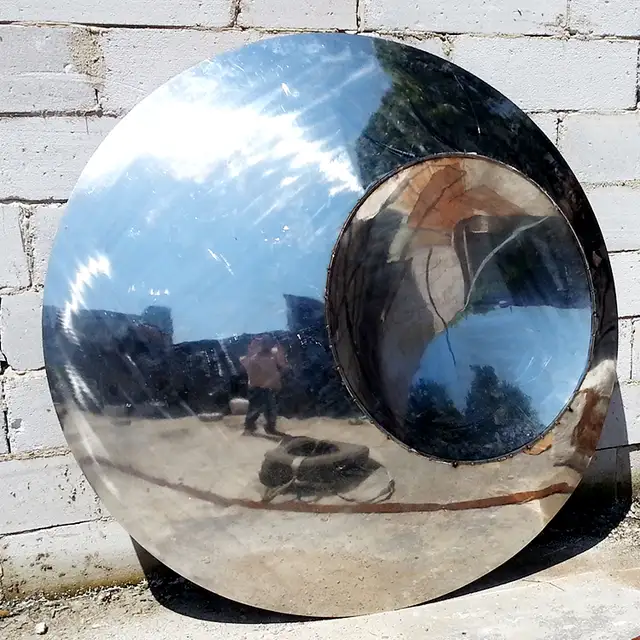 Large stainless steel sculpture—Mirror concave sculpture seen from another angle