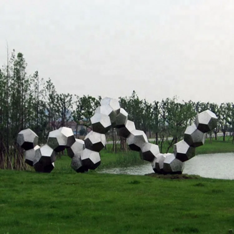 Modern abstract stainless steel polished stone snake