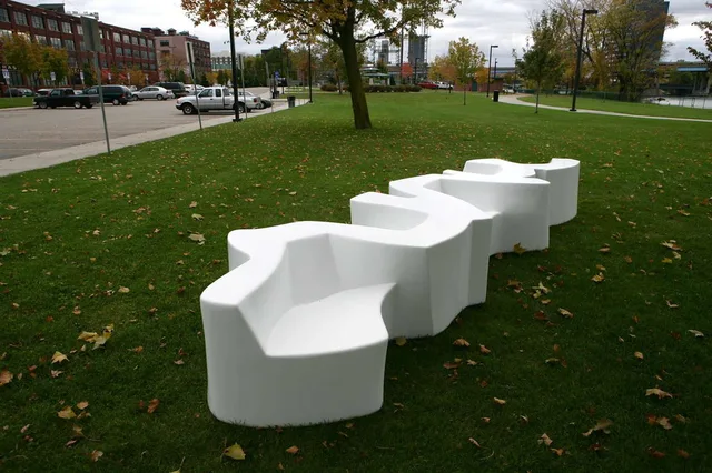 Modern art sculpture stainless steel bench design in close view