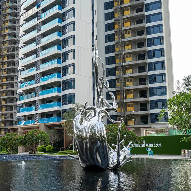 Modern large outdoor square pool stainless steel spray sculpture from the side