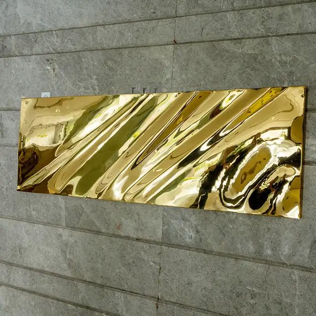 Home decorations blue stainless steel wall sculpture seen from another angle