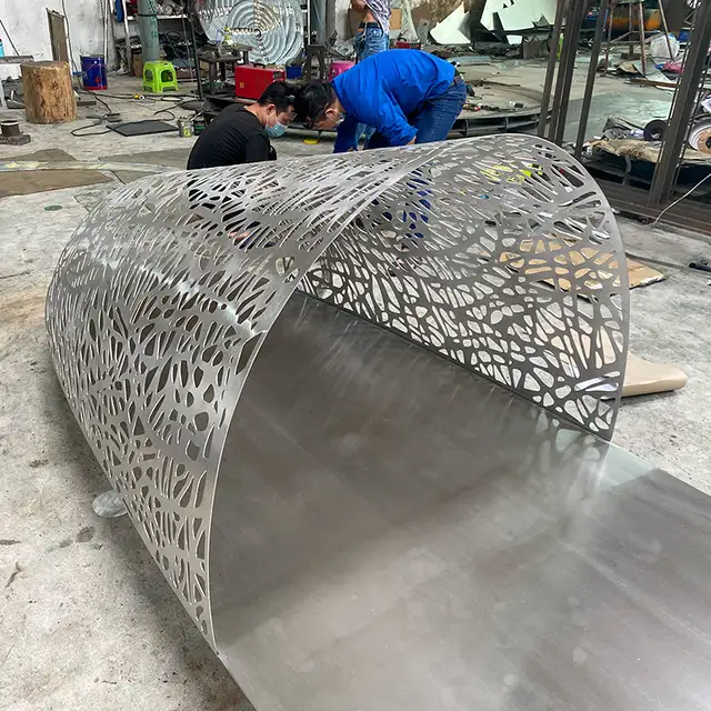 Modern outdoor park waterscape metal sculpture stainless steel boat sculpture in close view