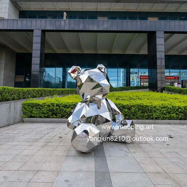 Outdoor airport park square school library cinema museum mirror polished stainless steel bear sculpture in close view