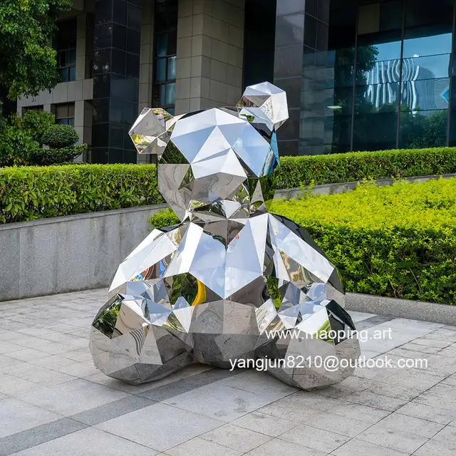 Outdoor airport park square school library cinema museum mirror polished stainless steel bear sculpture seen from anothe