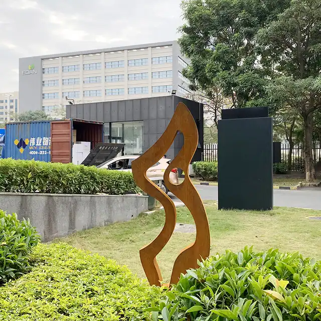 Outdoor garden Corten steel flame sculpture in close view