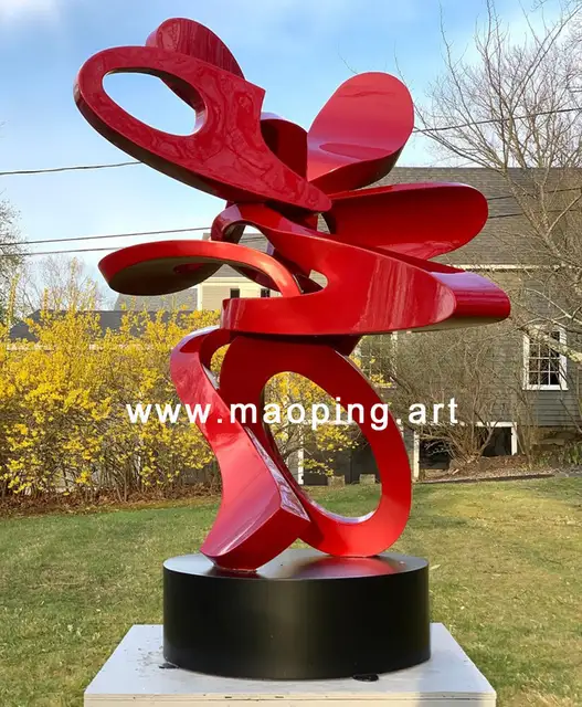 Outdoor garden courtyard Abstract red stainless steel sculpture from the side